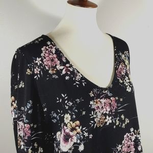 Top: Hi-Lo V-Neck Floral Blouse